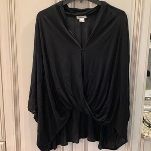Sheer long sleeved top. Longer in back